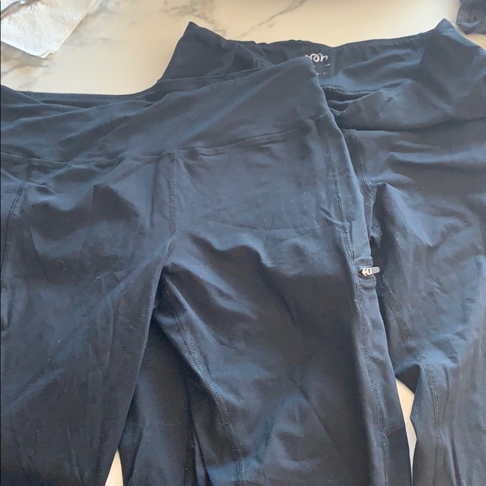 Selling 2 pairs of Maurices black leggings Sz M